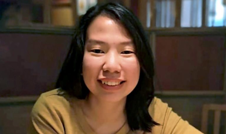 A business woman smiling at the camera