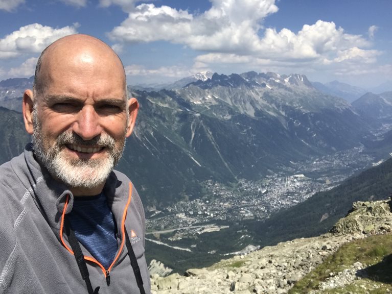 Ian hiking on mountain