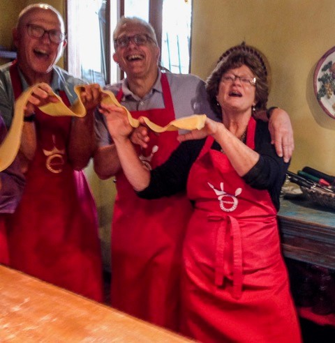 Jack and husband making pasta in Italy