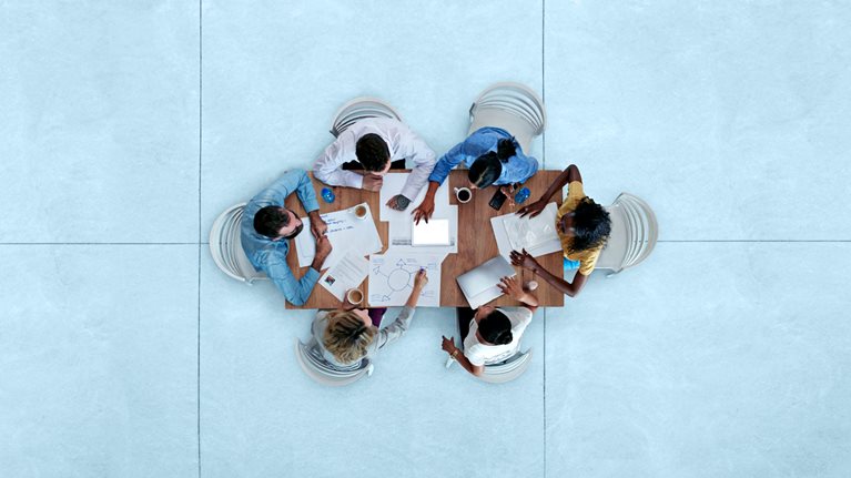 Top view of creative businesspeople having meeting 